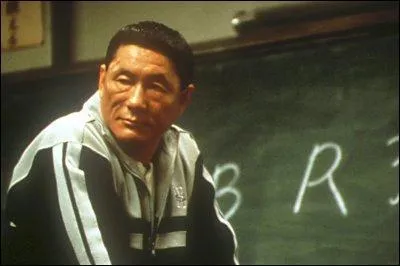 Dans Battle Royale o est-ce que Nobu blessa Takeshi d'un coup de couteau  la sortie des cours ?