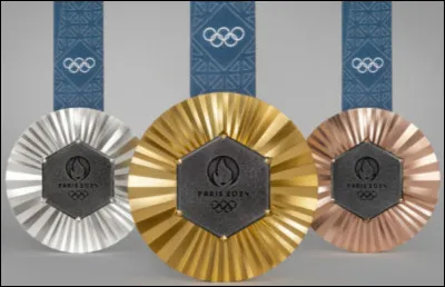 Quelle est la première femme à recevoir une médaille dor de lhistoire des J.O ?