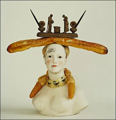 Voici Le Buste rétrospectif d'une femme. Où Dali y a-t-il mis L'Angélus ?