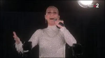 Quel est le titre de la chanson interprétée par Céline Dion pour l'ouverture des Jeux olympiques ?