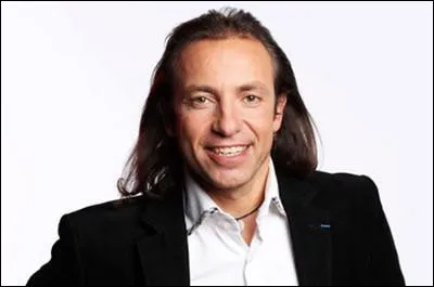 Quel était le sport de prédilection de Philippe Candeloro avant de se reconvertir comme consultant sportif ?