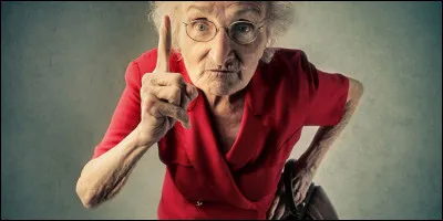 Qui est le mentor humain de Babar lorsqu'il arrive en ville ?