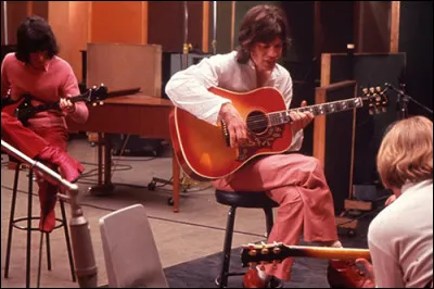 Quel groupe de rock est au cur du film documentaire "One + One", sorti en 1968 et réalisé par Jean-Luc Godard ?