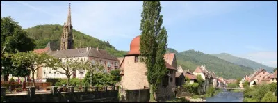 Quelle est cette ville de 7 700 habitants, situ&eacute;e &agrave; l'ouest de Mulhouse, &agrave; l'entr&eacute;e de la vall&eacute;e de la Thur, au pied des Vosges ?