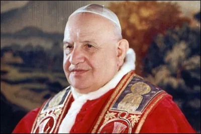 Qui est le Saint patron de l'armée italienne, de l'unité chrétienne, du concile Vatican II et de Bergame dont les symboles sont les attributs pontificaux, la tiare pontificale et le camauro ?