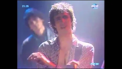 Comment s'appelle le slow rock qu'il a écrit et chanté avec ce groupe en 1987 ?