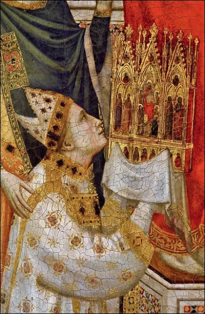 Dans quel musée peut-on admirer un cardinal portant sa propre représentation dans un triptyque ?