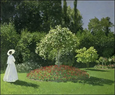 Qu a immortalisé cette femme en robe blanche dans le jardin ?