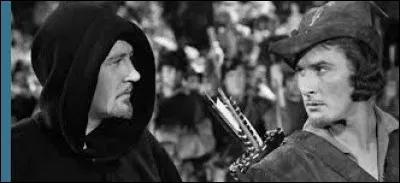 Qui est le personnage à gauche sur la photo ?