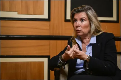 Quelle profession exerce Nathalie Tomasini ?