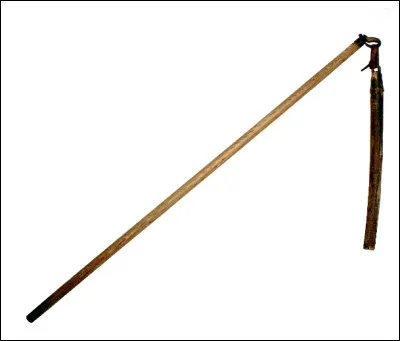 Quel est le nom de cet instrument de frappe, un outil qui sert à battre les céréales pour séparer les grains et la paille ?