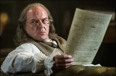 Comment s'appelle cette série créée par Stephen David et David C. White, et dans laquelle Norris joue Benjamin Franklin ?