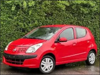 Cette petite voiture rouge est une ...