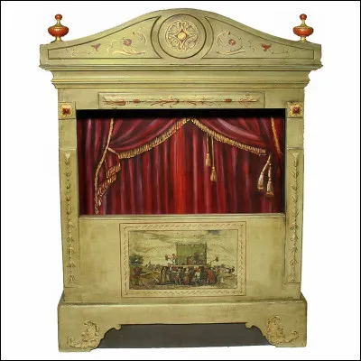 Comment appelle-t-on cet élément de décor de théâtre de marionnettes ?