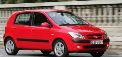 Cette voiture rouge est une ...