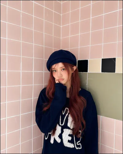 Quelle taille fait Minju ?