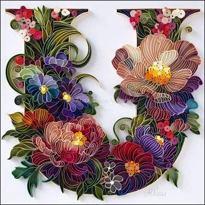 U comme Ustensile : lequel de ces ustensiles de cuisine correspond à une spatule munie d'un racloir ?