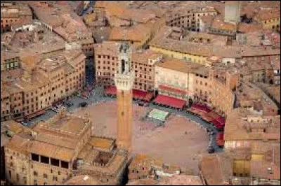 Le nom de cette ville de Toscane, connue pour son patrimoine et sa Piazza del Campo, se termine par un ...