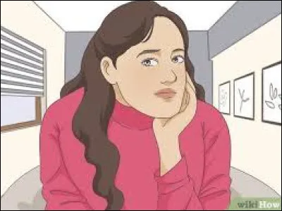 Elle a pris un air réservé, elle est sur son...