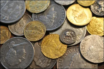 En numismatique, comment appelle-ton le côté face d'une pièce de monnaie ?