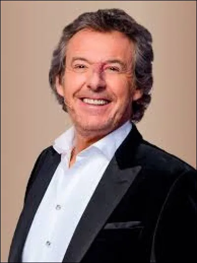 Depuis quelle année l'animateur, comédien, humoriste, producteur et imitateur, Jean-Luc Reichmann, présente-t-il le jeu ''Les 12 coups de midi'' sur TF1 ?