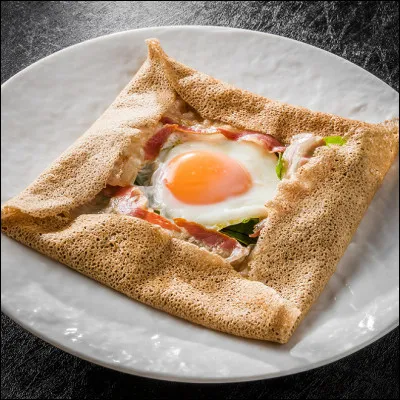 Quel est le nom d'une crêpe constituée de fromage râpé, de jambon et d'un uf ?