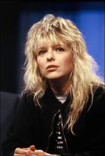 Quel adverbe est le nom d'une chanson de France Gall sortie en 1987 ?
