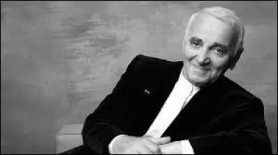 Quel adverbe est le nom d'une chanson de Charles Aznavour ?