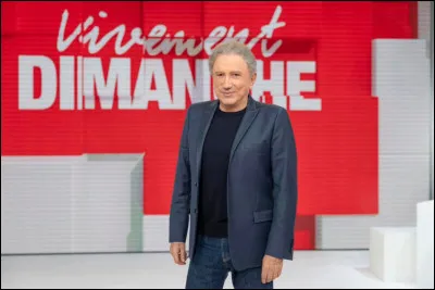 Quel compagnon animalier accompagne Michel Drucker dans l'émission "Vivement dimanche" ?