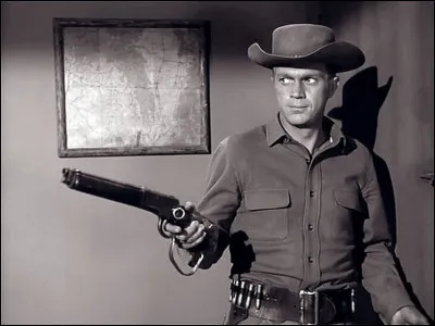Quel est le nom du personnage à la winchester au canon scié, incarné par Steve McQueen dans la série ''Au nom de loi'' ?
