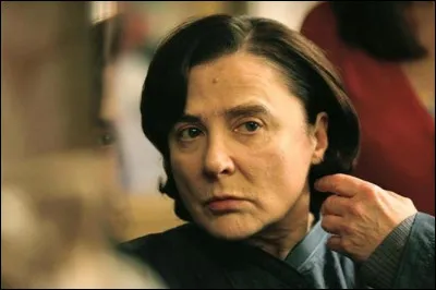 Dans le roman "L'Élégance du hérisson" de Muriel Barbery, quel est le métier de Mme Michel ?