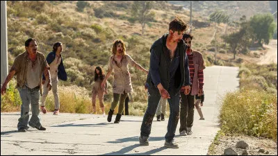 Que donne Rick à Morgan pour garder le contact dans l'épisode 1 ?