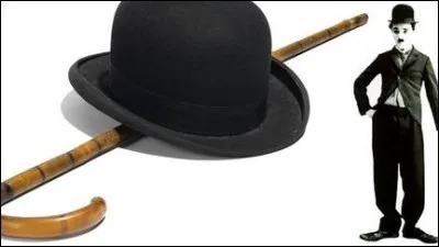 Dans quel film Chaplin adopte-t-il son célèbre chapeau et sa canne pour la première fois ?