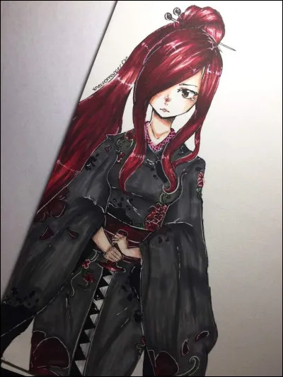 Où Erza a-t-elle passé une partie de son enfance ?