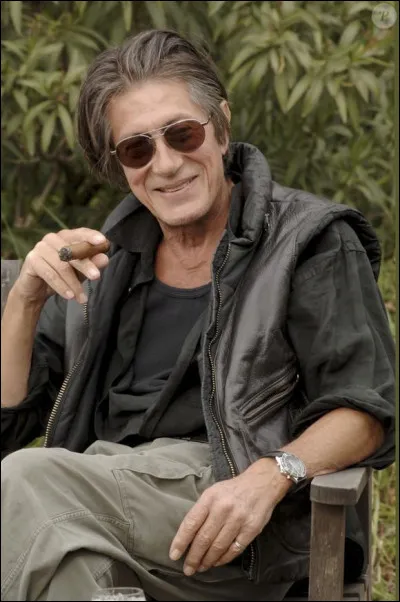 "C'était un petit jardin / Avec une table et une chaise de jardin / Avec deux arbres, un pommier et un sapin / Au fond d'une cour à la Chaussée-d'Antin / Mais un jour près du jardin / Passa un homme qui au revers de son veston / Portait une fleur de béton / Dans le jardin une voix chanta / De grâce, de grâce, monsieur le promoteur / De grâce, de grâce, ne coupez pas mes fleurs...". Ces paroles sont extraites d'une chanson de Jacques Dutronc. Quel est son titre ?