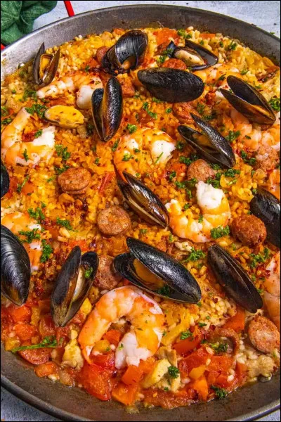 Quant à la paella, elle est originaire de quel pays ?