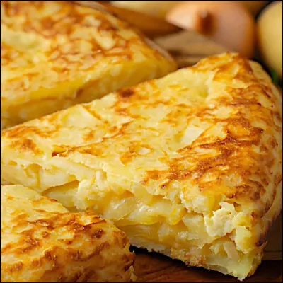 Dans la cuisine espagnole, comment appelle-t-on l'omelette épaisse aux pommes de terre ?