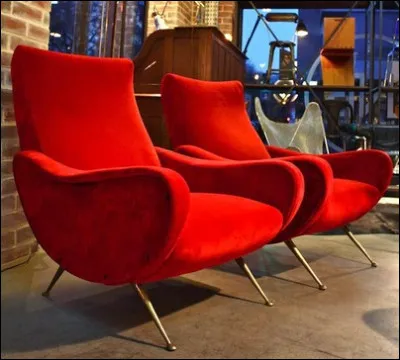 De quel pays est originaire ce fauteuil des années 50 ?