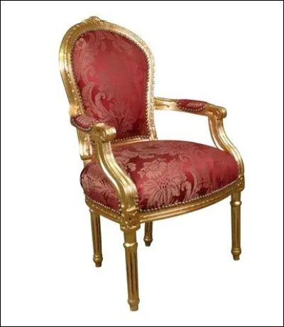 Quel est le style de ce fauteuil aux pieds cannelés ?