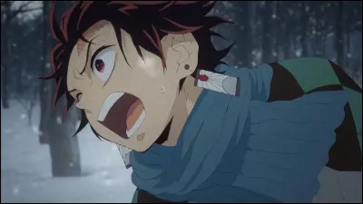 Avec quelle arme Tanjiro se défend-il contre le premier Pilier qu'il rencontre ?