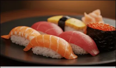 Quel est le nom du mets traditionnel japonais à base de riz vinaigré et de poisson cru ?
