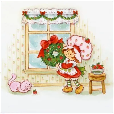 Qui est en train de déposer une couronne de Noël sur sa fenêtre ?