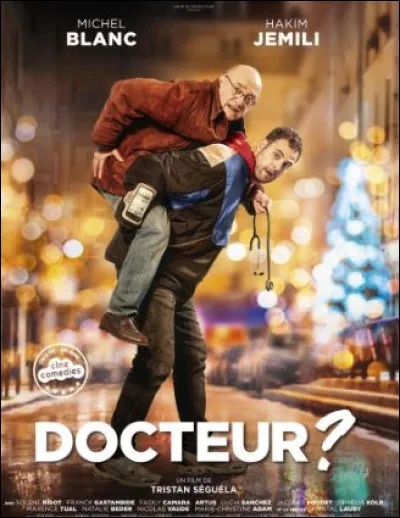 Dans le film "Docteur ?" sorti en 2019, &agrave; qui le m&eacute;decin (Michel Blanc) est-il contraint de d&eacute;l&eacute;guer les soins &agrave; divers patients la nuit de No&euml;l ?