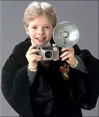 Quel est le nouveau personnage qui prend des photos ?