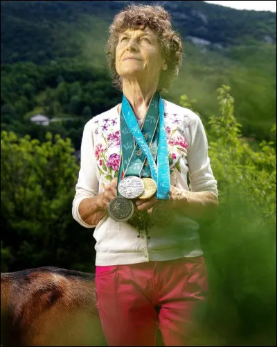 Comment se nomme cette cycliste, championne olympique de la course en ligne aux Jeux olympiques de 1996 ?