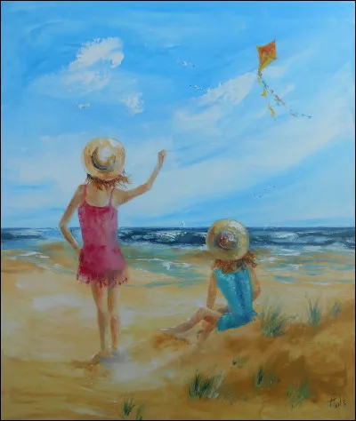 Un enfant jouant avec un ..., passait son temps &agrave; la plage.