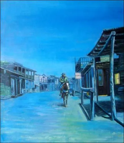 Comment décririez-vous cette ville où le pistolero a pour la dernière fois fait étape, avant de pénétrer dans le désert ?