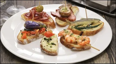 Quelle ville V&eacute;n&eacute;tie est le berceau des cicchetti, petits en-cas sal&eacute;s vari&eacute;s ?