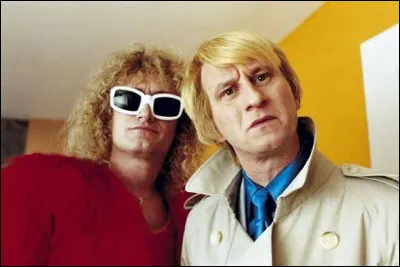 Comment s'appelle le personnage jou&eacute; par Jean-Paul Rouve dans le film "Podium" ?