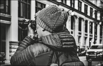 Prendre en photo un inconnu dans la rue.